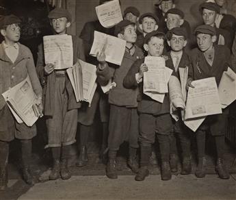 LEWIS W. HINE (1874-1940) After midnight April 17, 1912, and still selling extras * Lunch Time, 14th St., N.Y.